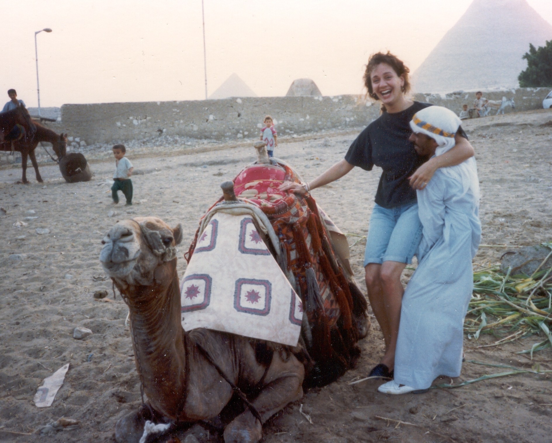 1990 Cairo, Egypt,  Jane Andreassi about to enjoy her first camel ride during a layover associated with a military charter.